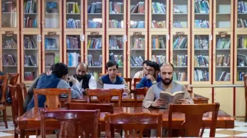 Afghanistan's rulers ban textbooks written by female authors from the nation's universities